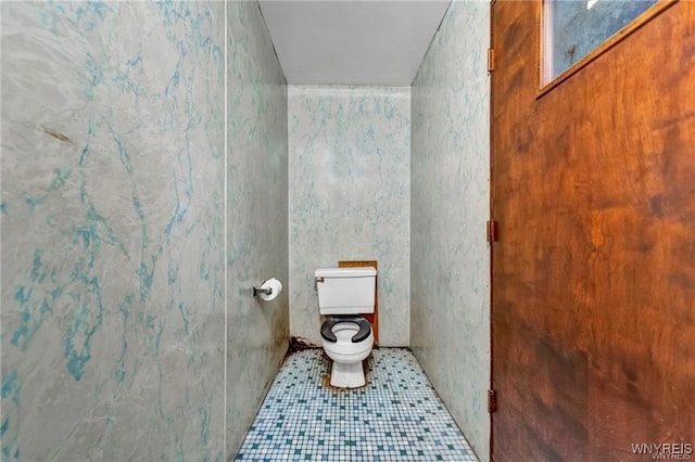 3045 Niagara St, Niagara Falls, NY 14303 - bathroom with toilet and tile patterned floors
