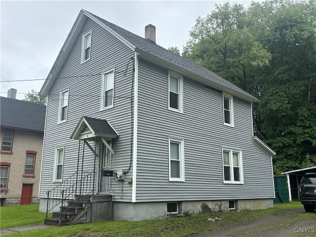 10 Otter Creek Pl, Cortland, NY 13045 - view of property exterior with a chimney