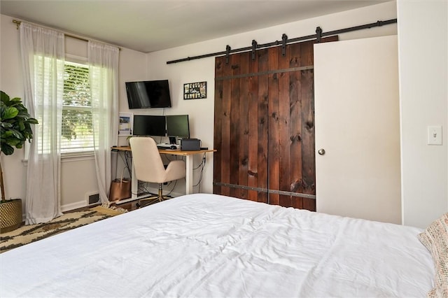 669 Webster Rd, Webster, NY 14580 - bedroom with a barn door