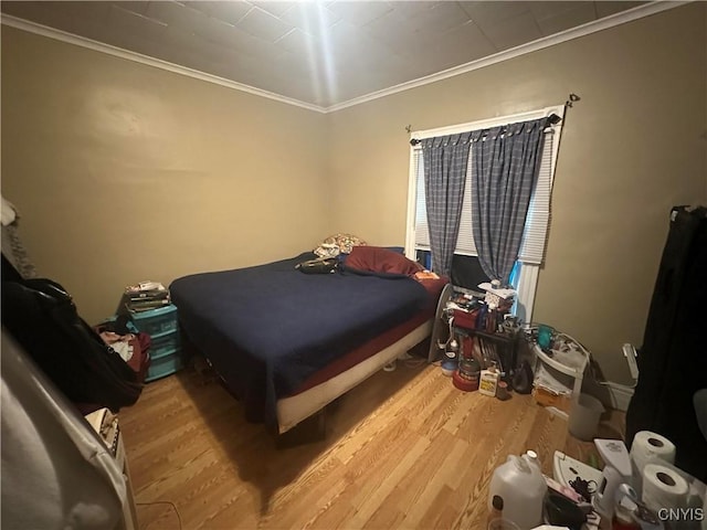 319 Shuart Ave, Syracuse, NY 13203 - bedroom featuring crown molding and wood finished floors