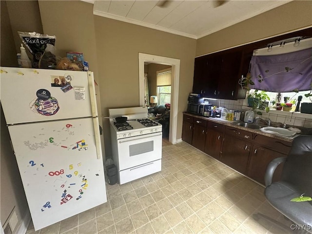 319 Shuart Ave, Syracuse, NY 13203 - kitchen featuring white appliances, ornamental molding, decorative backsplash, dark brown cabinetry, and a sink