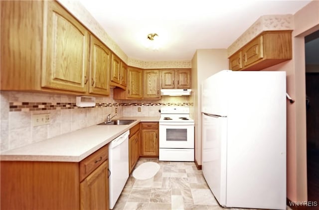 1162 Indian Church Rd Unit 8, West Seneca, NY 14224 - kitchen featuring white appliances, under cabinet range hood, a sink, light countertops, and decorative backsplash