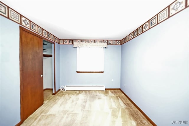 1162 Indian Church Rd Unit 8, West Seneca, NY 14224 - unfurnished bedroom featuring a baseboard radiator, baseboards, carpet floors, and a closet
