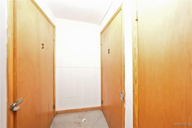 1162 Indian Church Rd Unit 8, West Seneca, NY 14224 - hall with baseboards and concrete flooring
