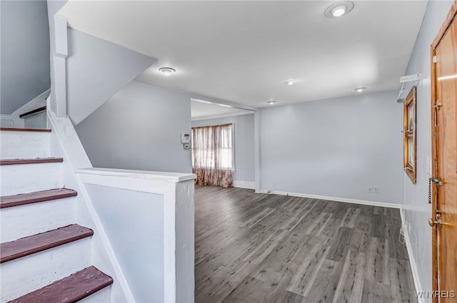 46 Wilkes Ave, Buffalo, NY 14215 - stairway with wood finished floors, baseboards, and vaulted ceiling