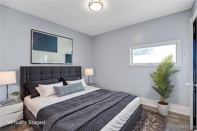 46 Wilkes Ave, Buffalo, NY 14215 - bedroom featuring wood finished floors and baseboards