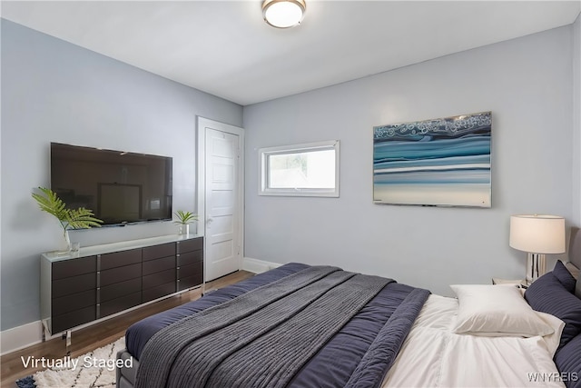 46 Wilkes Ave, Buffalo, NY 14215 - bedroom with wood finished floors and baseboards