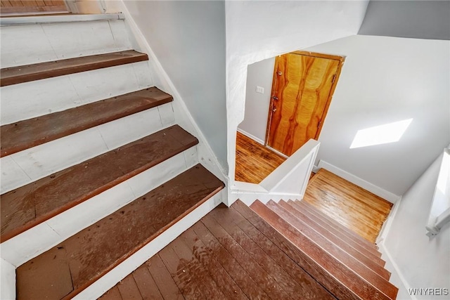 46 Wilkes Ave, Buffalo, NY 14215 - stairs with hardwood / wood-style floors and baseboards