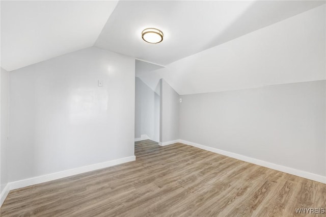 46 Wilkes Ave, Buffalo, NY 14215 - bonus room with lofted ceiling, wood finished floors, and baseboards