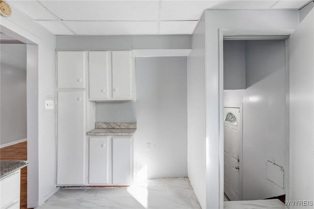 46 Wilkes Ave, Buffalo, NY 14215 - kitchen with white cabinets and a drop ceiling