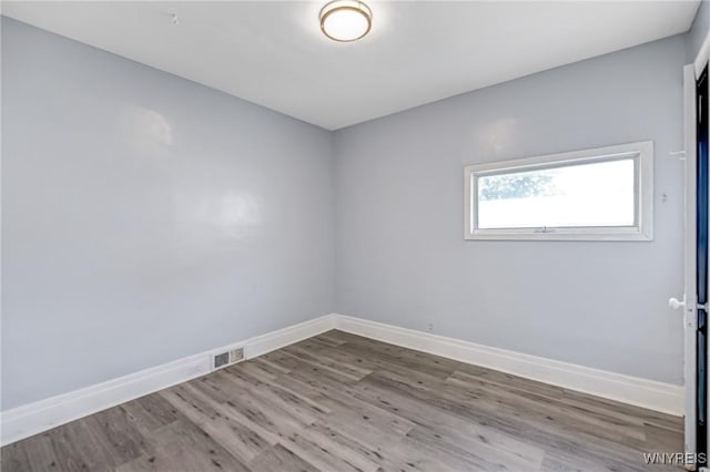 46 Wilkes Ave, Buffalo, NY 14215 - unfurnished room with wood finished floors and baseboards