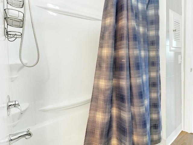 13 W Crest Dr, Gates, NY 14606 - bathroom featuring shower / bath combo with shower curtain