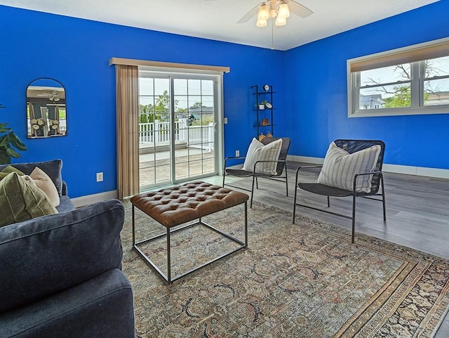13 W Crest Dr, Gates, NY 14606 - living area with ceiling fan, wood finished floors, and baseboards