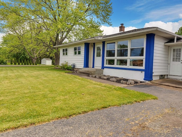 13 W Crest Dr, Gates, NY 14606 - ranch-style home featuring a chimney, a front yard, and entry steps