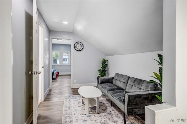 57 Davidson Ave, Buffalo, NY 14215 - living room with baseboards, wood finished floors, lofted ceiling, and recessed lighting