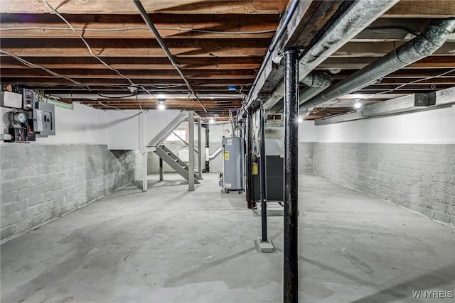 57 Davidson Ave, Buffalo, NY 14215 - basement featuring water heater, stairs, and electric panel