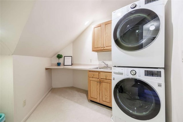 8 Hidden Springs Dr, Pittsford, NY 14534 - laundry area featuring stacked washer and clothes dryer, cabinet space, light colored carpet, and baseboards
