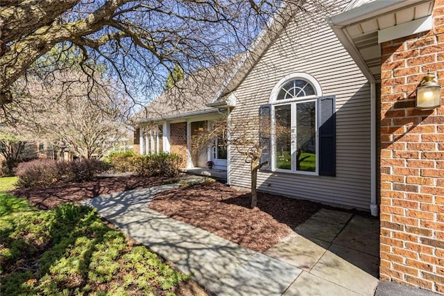 8 Hidden Springs Dr, Pittsford, NY 14534 - property entrance with brick siding