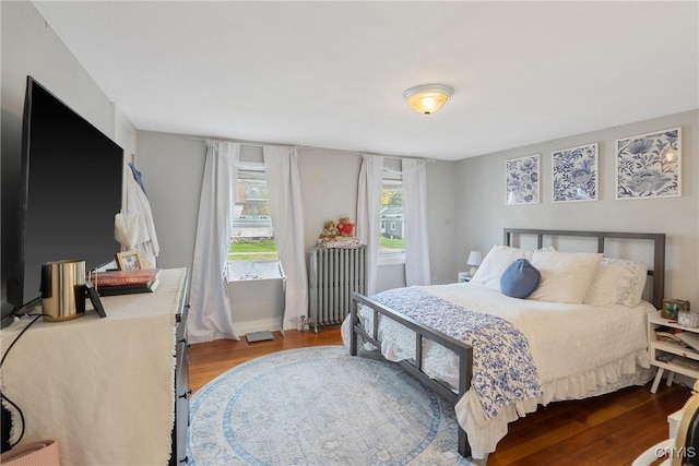 184 Liberty St, Oswego-City, NY 13126 - bedroom with radiator and wood finished floors