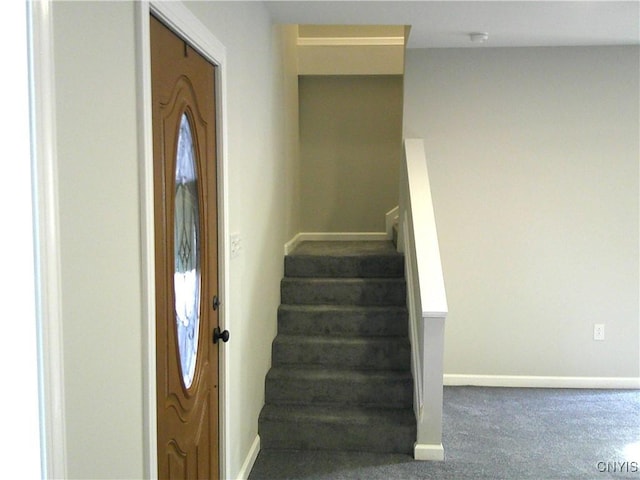 8457 S Main St, Le Ray, NY 13637 - stairs with baseboards and carpet floors