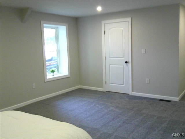 8457 S Main St, Le Ray, NY 13637 - unfurnished bedroom featuring carpet floors, baseboards, and recessed lighting