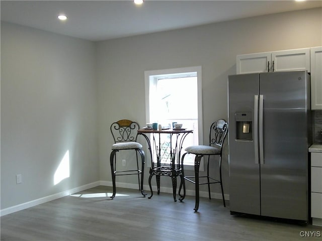 8457 S Main St, Le Ray, NY 13637 - dining room with light wood-style flooring, baseboards, and recessed lighting
