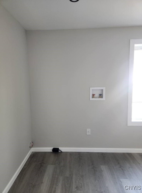 8457 S Main St, Le Ray, NY 13637 - laundry room featuring hookup for a washing machine, dark wood finished floors, and plenty of natural light