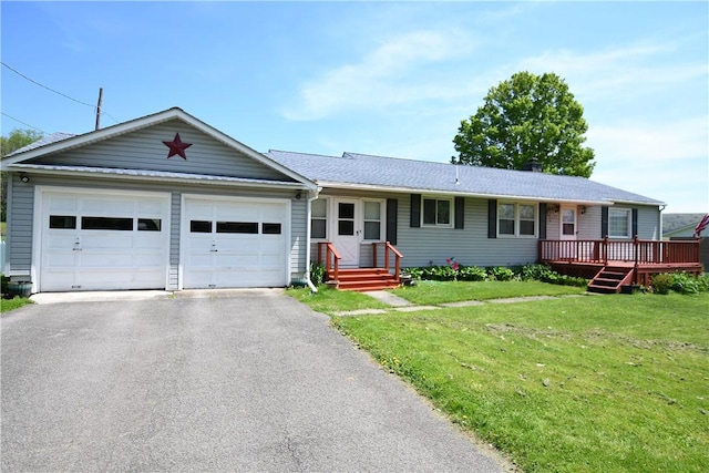 158 Dingman Hill Rd, Bainbridge, NY 13733 - single story home with a front lawn, a garage, asphalt driveway, and a wooden deck