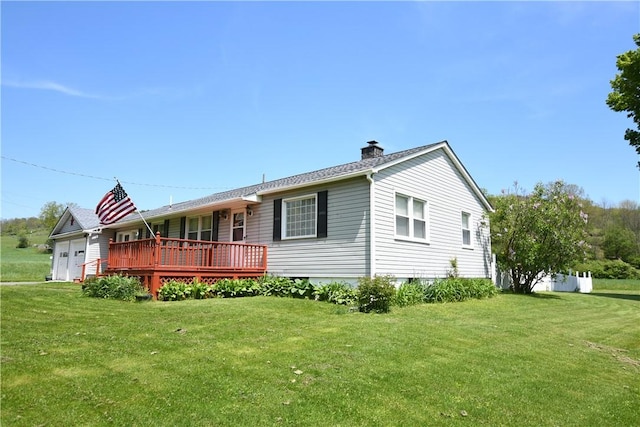 158 Dingman Hill Rd, Bainbridge, NY 13733 - rear view of house featuring a chimney, a yard, and a garage