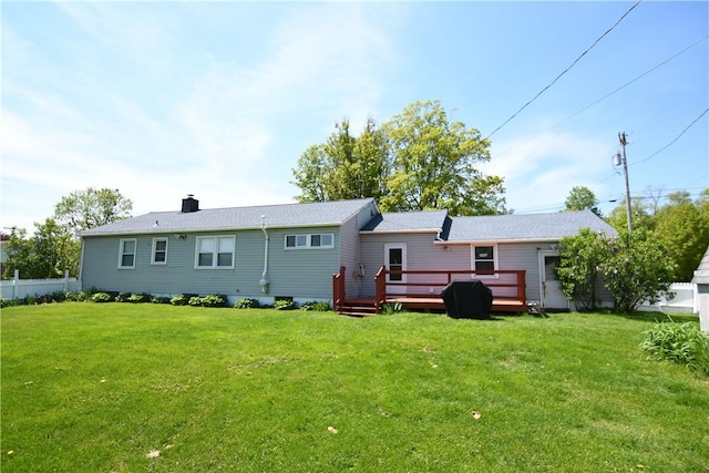 158 Dingman Hill Rd, Bainbridge, NY 13733 - rear view of house featuring a lawn, a wooden deck, and a chimney