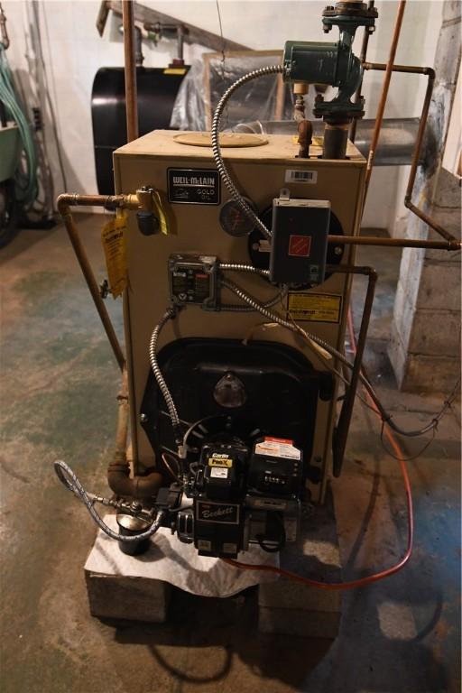158 Dingman Hill Rd, Bainbridge, NY 13733 - utility room featuring a heating unit and oil tank