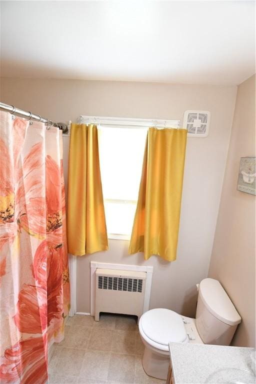 158 Dingman Hill Rd, Bainbridge, NY 13733 - full bathroom with radiator, vanity, toilet, and a shower with curtain