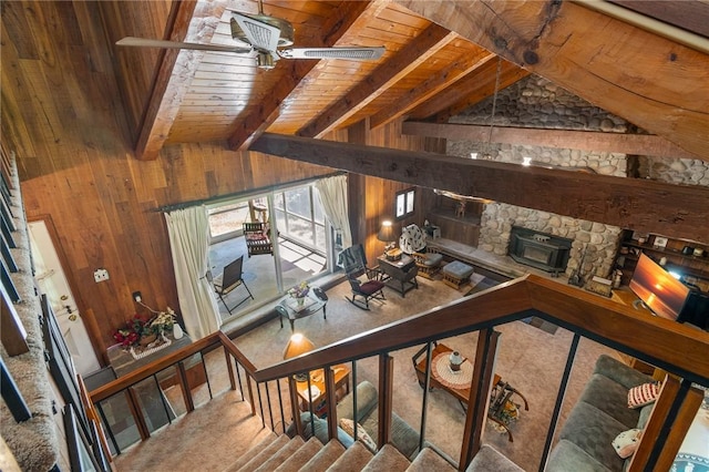 4482 Cory Corners Rd, Marion, NY 14505 - living area with wood ceiling, wooden walls, and carpet floors