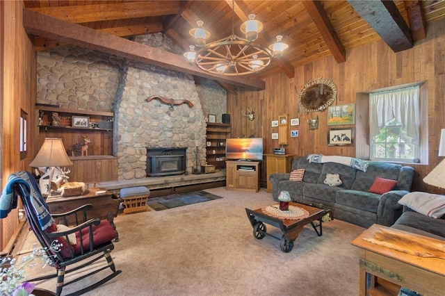 4482 Cory Corners Rd, Marion, NY 14505 - living room featuring wood ceiling, a chandelier, carpet, wooden walls, and a wood stove