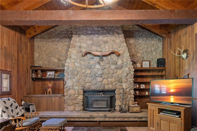 4482 Cory Corners Rd, Marion, NY 14505 - living area featuring wood ceiling, wood walls, and a wood stove
