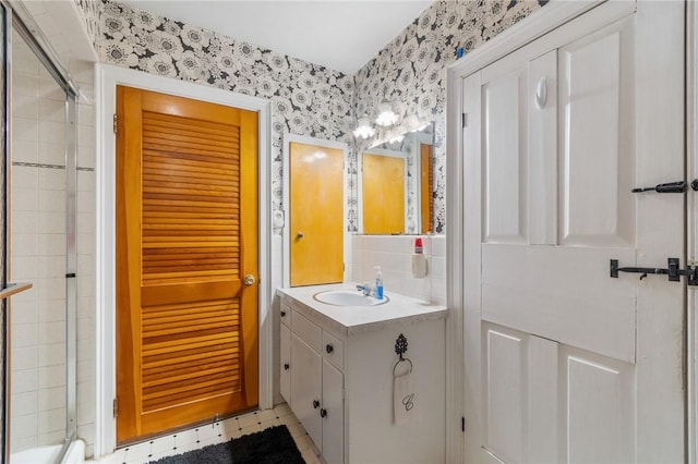 4482 Cory Corners Rd, Marion, NY 14505 - bathroom with wallpapered walls, vanity, and a shower stall