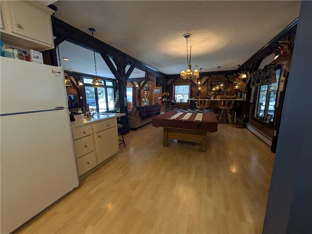 73 Derosia Rd, Lafayette, PA 16738 - recreation room featuring baseboard heating, a chandelier, light wood-style flooring, and billiards table