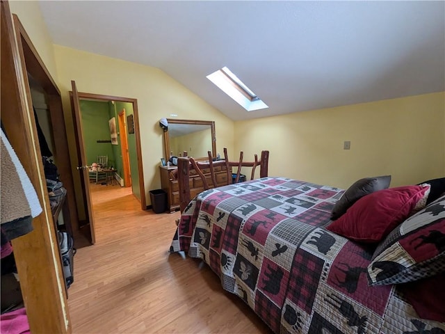 73 Derosia Rd, Lafayette, PA 16738 - bedroom featuring a skylight, light wood-type flooring, and vaulted ceiling