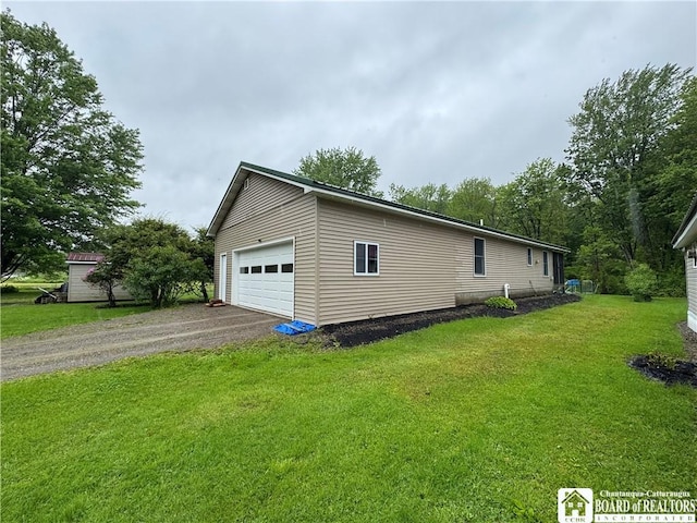 131 Goose Creek Rd, Busti, NY 14710 - view of side of property with a lawn and a detached garage