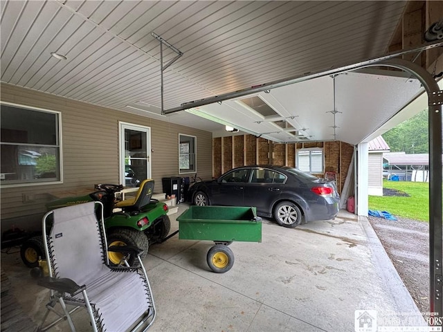 131 Goose Creek Rd, Busti, NY 14710 - garage featuring a carport