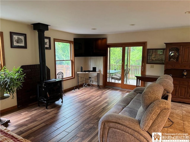 131 Goose Creek Rd, Busti, NY 14710 - living room featuring a wood stove, healthy amount of natural light, light wood-style floors, baseboards, and recessed lighting