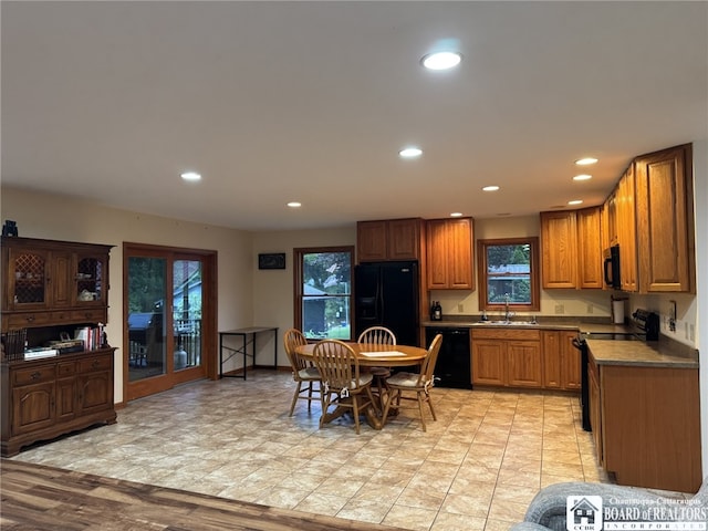 131 Goose Creek Rd, Busti, NY 14710 - kitchen featuring black appliances, healthy amount of natural light, recessed lighting, and brown cabinets