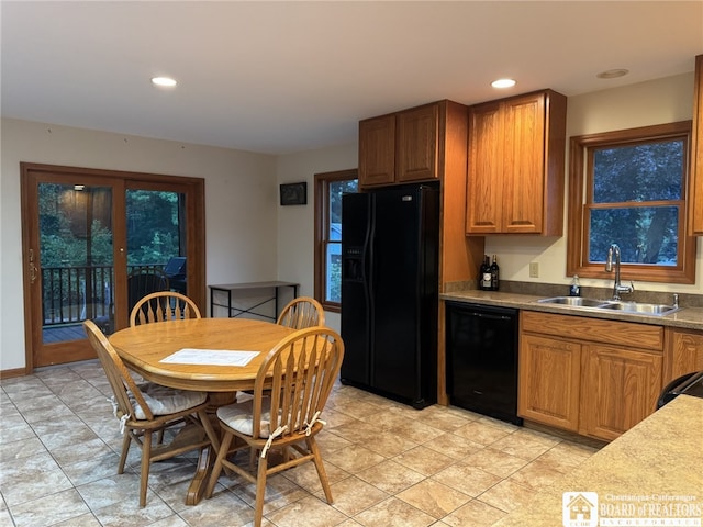 131 Goose Creek Rd, Busti, NY 14710 - kitchen with black appliances, brown cabinets, and recessed lighting