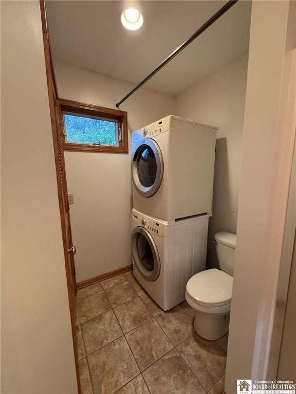 131 Goose Creek Rd, Busti, NY 14710 - bathroom featuring stacked washer / drying machine and tile patterned flooring