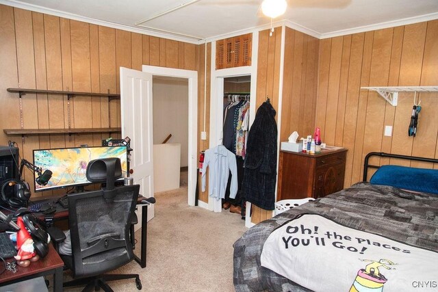 204 E Ellis St, Dewitt, NY 13057 - bedroom with light colored carpet, ornamental molding, wooden walls, and an office area