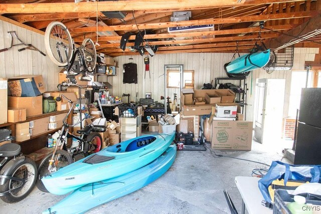 204 E Ellis St, Dewitt, NY 13057 - garage featuring wood walls