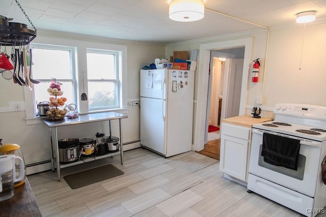 204 E Ellis St, Dewitt, NY 13057 - kitchen featuring white appliances, a baseboard radiator, ornamental molding, white cabinets, and light countertops
