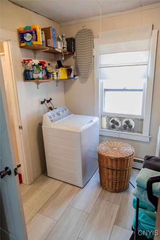 204 E Ellis St, Dewitt, NY 13057 - laundry room featuring washer / clothes dryer, light wood finished floors, crown molding, and a baseboard heating unit