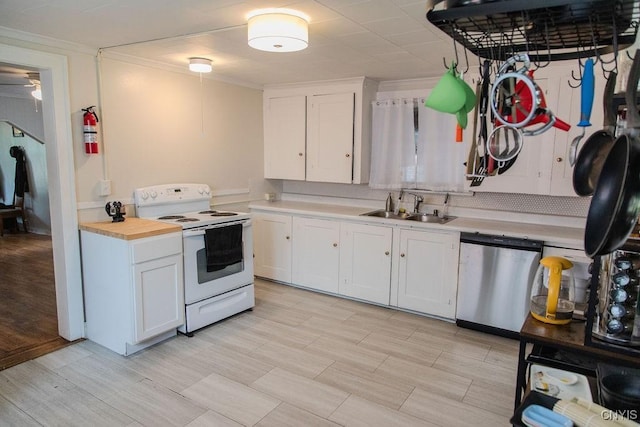 204 E Ellis St, Dewitt, NY 13057 - kitchen with white electric range, stainless steel dishwasher, a sink, white cabinets, and wood counters
