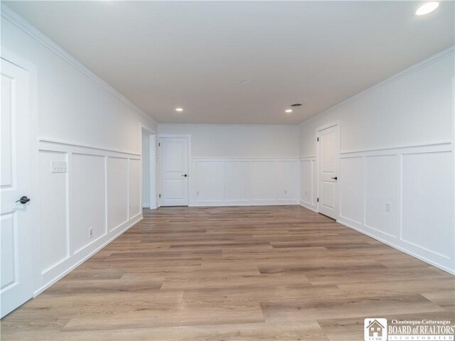 413 Chautauqua Ave, Jamestown, NY 14701 - unfurnished room featuring a decorative wall, ornamental molding, recessed lighting, and light wood finished floors